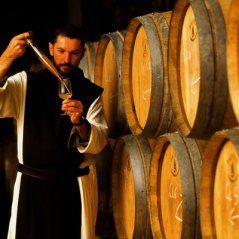 Monk tasting barrel sample